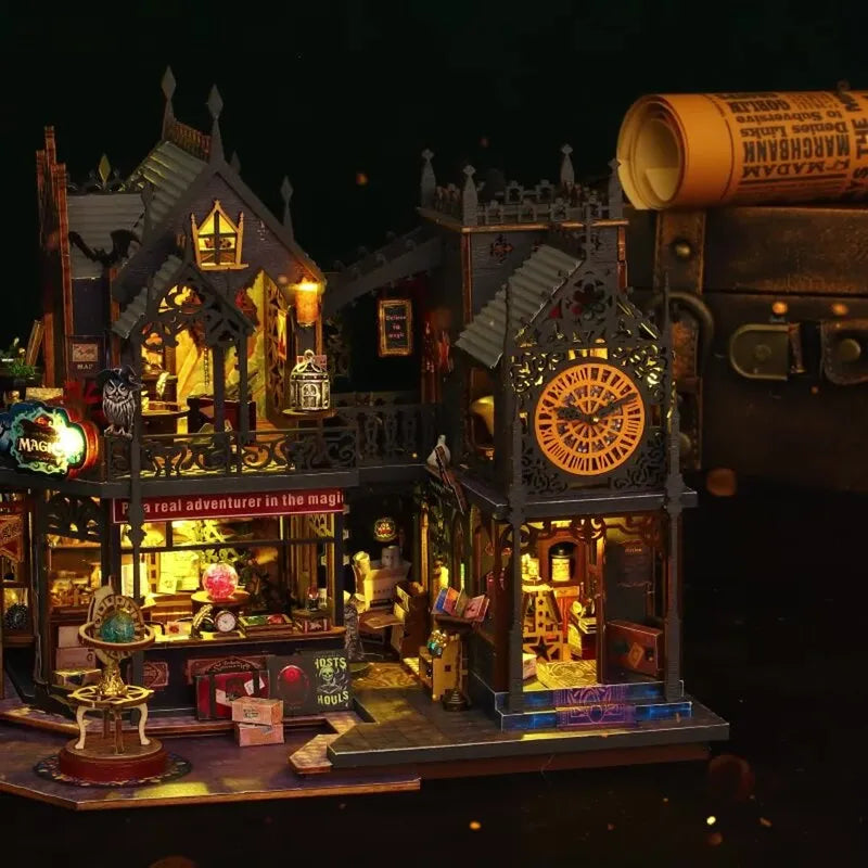 Maison Miniature - Holo Magic City, un kit créatif pour construire un diorama miniature. Parfait pour décorer une bibliothèque ou comme cadeau original pour un amoureux des livres. Par Nookette.