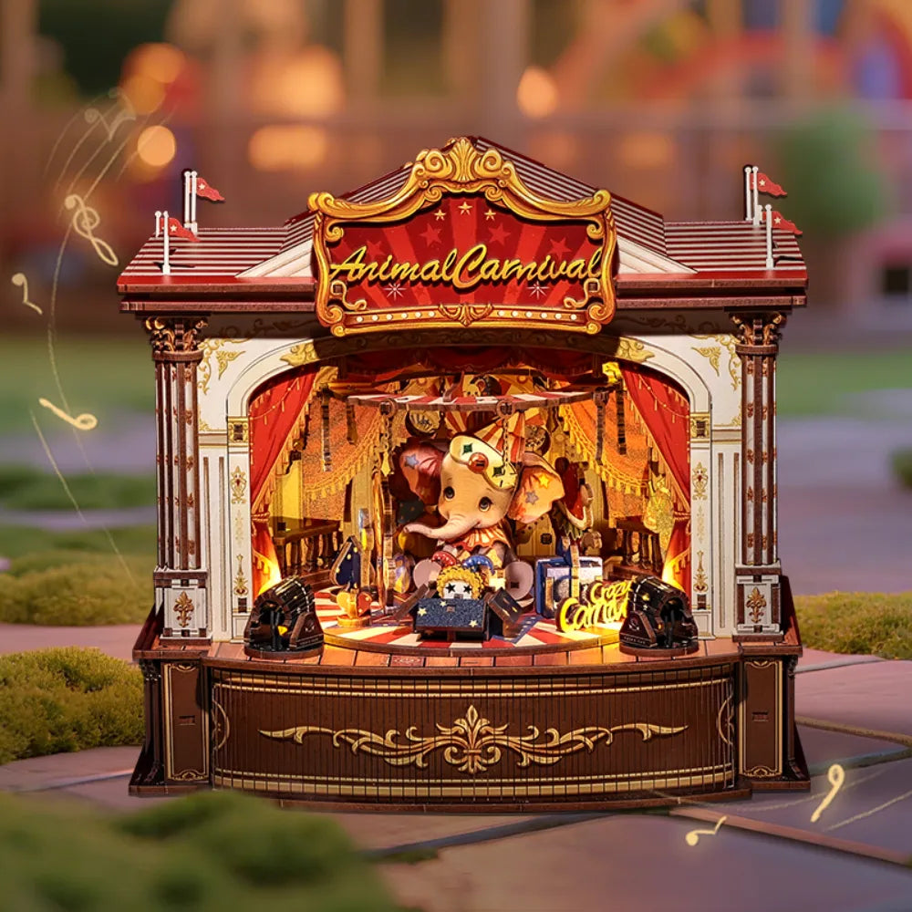 Wooden Music Box - Animal Carnival, un kit créatif pour construire un diorama miniature. Parfait pour décorer une bibliothèque ou comme cadeau original pour un amoureux des livres. Par Nookette.